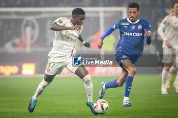 2024-02-04 - Ernest NUAMAH of Lyon and Azzedine OUNAHI of Marseille during the French championship Ligue 1 football match between Olympique Lyonnais (Lyon) and Olympique de Marseille on February 4, 2024 at Groupama Stadium in Décines-Charpieu near Lyon, France - FOOTBALL - FRENCH CHAMP - LYON V MARSEILLE - FRENCH LIGUE 1 - SOCCER