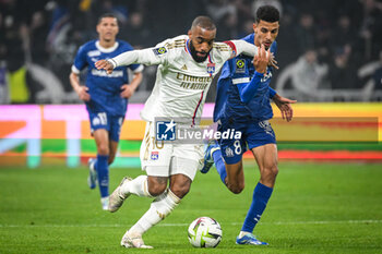 2024-02-04 - Alexandre LACAZETTE of Lyon and Azzedine OUNAHI of Marseille during the French championship Ligue 1 football match between Olympique Lyonnais (Lyon) and Olympique de Marseille on February 4, 2024 at Groupama Stadium in Décines-Charpieu near Lyon, France - FOOTBALL - FRENCH CHAMP - LYON V MARSEILLE - FRENCH LIGUE 1 - SOCCER