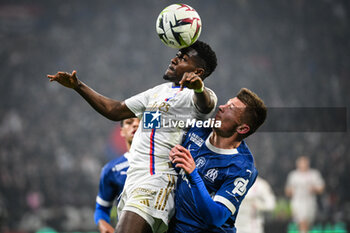 2024-02-04 - Ernest NUAMAH of Lyon and Quentin MERLIN of Marseille during the French championship Ligue 1 football match between Olympique Lyonnais (Lyon) and Olympique de Marseille on February 4, 2024 at Groupama Stadium in Décines-Charpieu near Lyon, France - FOOTBALL - FRENCH CHAMP - LYON V MARSEILLE - FRENCH LIGUE 1 - SOCCER