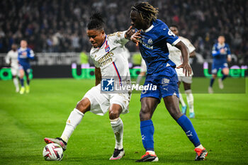 2024-02-04 - Gift ORBAN of Lyon and Bamo MEITE of Marseille during the French championship Ligue 1 football match between Olympique Lyonnais (Lyon) and Olympique de Marseille on February 4, 2024 at Groupama Stadium in Décines-Charpieu near Lyon, France - FOOTBALL - FRENCH CHAMP - LYON V MARSEILLE - FRENCH LIGUE 1 - SOCCER