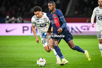 2024-02-10 - Tiago SANTOS of Lille and Ousmane DEMBELE of PSG during the French championship Ligue 1 football match between Paris Saint-Germain and Losc Lille on February 10, 2024 at Parc des Princes stadium in Paris, France - FOOTBALL - FRENCH CHAMP - PARIS SG V LILLE - FRENCH LIGUE 1 - SOCCER