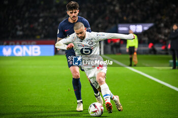 2024-02-10 - Edon ZHEGROVA of Lille and Lucas BERALDO of PSG during the French championship Ligue 1 football match between Paris Saint-Germain and Losc Lille on February 10, 2024 at Parc des Princes stadium in Paris, France - FOOTBALL - FRENCH CHAMP - PARIS SG V LILLE - FRENCH LIGUE 1 - SOCCER