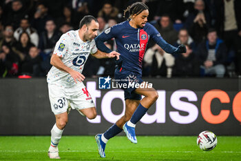 2024-02-10 - Ismaily GONCALVES DOS SANTOS of Lille and Bradley BARCOLA of PSG during the French championship Ligue 1 football match between Paris Saint-Germain and Losc Lille on February 10, 2024 at Parc des Princes stadium in Paris, France - FOOTBALL - FRENCH CHAMP - PARIS SG V LILLE - FRENCH LIGUE 1 - SOCCER