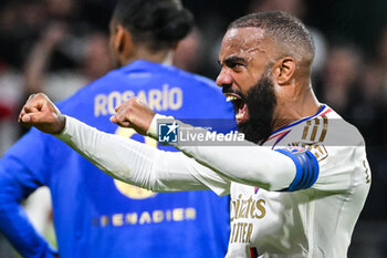 2024-02-16 - Alexandre LACAZETTE of Lyon celebrates the victory during the French championship Ligue 1 football match between Olympique Lyonnais (Lyon) and OGC Nice on February 16, 2024 at Groupama stadium in Decines-Charpieu near Lyon, France - FOOTBALL - FRENCH CHAMP - LYON V NICE - FRENCH LIGUE 1 - SOCCER