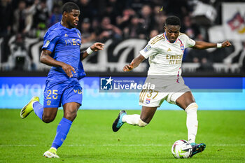 2024-02-16 - Mohamed-Ali CHO of Nice and Ernest NUAMAH of Lyon during the French championship Ligue 1 football match between Olympique Lyonnais (Lyon) and OGC Nice on February 16, 2024 at Groupama stadium in Decines-Charpieu near Lyon, France - FOOTBALL - FRENCH CHAMP - LYON V NICE - FRENCH LIGUE 1 - SOCCER