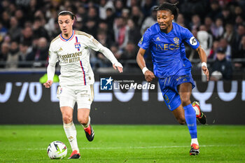 2024-02-16 - Maxence CAQUERET of Lyon and Khephren THURAM of Nice during the French championship Ligue 1 football match between Olympique Lyonnais (Lyon) and OGC Nice on February 16, 2024 at Groupama stadium in Decines-Charpieu near Lyon, France - FOOTBALL - FRENCH CHAMP - LYON V NICE - FRENCH LIGUE 1 - SOCCER