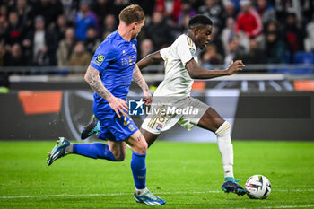 2024-02-16 - Melvin BARB of Nice and Ernest NUAMAH of Lyon during the French championship Ligue 1 football match between Olympique Lyonnais (Lyon) and OGC Nice on February 16, 2024 at Groupama stadium in Decines-Charpieu near Lyon, France - FOOTBALL - FRENCH CHAMP - LYON V NICE - FRENCH LIGUE 1 - SOCCER