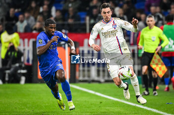 2024-02-16 - Mohamed-Ali CHO of Nice and Nicolas TAGLIAFICO of Lyon during the French championship Ligue 1 football match between Olympique Lyonnais (Lyon) and OGC Nice on February 16, 2024 at Groupama stadium in Decines-Charpieu near Lyon, France - FOOTBALL - FRENCH CHAMP - LYON V NICE - FRENCH LIGUE 1 - SOCCER