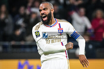 2024-02-16 - Alexandre LACAZETTE of Lyon celebrates the victory during the French championship Ligue 1 football match between Olympique Lyonnais (Lyon) and OGC Nice on February 16, 2024 at Groupama stadium in Decines-Charpieu near Lyon, France - FOOTBALL - FRENCH CHAMP - LYON V NICE - FRENCH LIGUE 1 - SOCCER