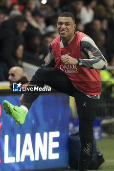 2024-02-17 - Kylian Mbappe of PSG warms up during the French championship Ligue 1 football match between FC Nantes and Paris Saint-Germain on February 17, 2024 at La Beaujoire - Louis Fonteneau stadium in Nantes, France - FOOTBALL - FRENCH CHAMP - NANTES V PARIS SG - FRENCH LIGUE 1 - SOCCER