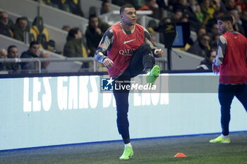 2024-02-17 - Kylian Mbappe of PSG warms up during the French championship Ligue 1 football match between FC Nantes and Paris Saint-Germain on February 17, 2024 at La Beaujoire - Louis Fonteneau stadium in Nantes, France - FOOTBALL - FRENCH CHAMP - NANTES V PARIS SG - FRENCH LIGUE 1 - SOCCER