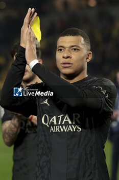 2024-02-17 - Kylian Mbappe of PSG salutes the supporters following the French championship Ligue 1 football match between FC Nantes and Paris Saint-Germain on February 17, 2024 at La Beaujoire - Louis Fonteneau stadium in Nantes, France - FOOTBALL - FRENCH CHAMP - NANTES V PARIS SG - FRENCH LIGUE 1 - SOCCER