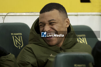 2024-02-17 - Kylian Mbappe of PSG on the bench during the French championship Ligue 1 football match between FC Nantes and Paris Saint-Germain on February 17, 2024 at La Beaujoire - Louis Fonteneau stadium in Nantes, France - FOOTBALL - FRENCH CHAMP - NANTES V PARIS SG - FRENCH LIGUE 1 - SOCCER