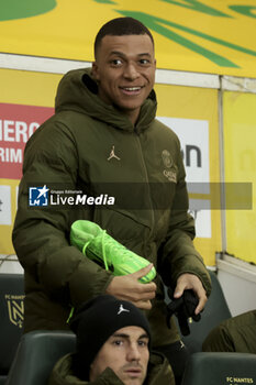2024-02-17 - Kylian Mbappe of PSG on the bench during the French championship Ligue 1 football match between FC Nantes and Paris Saint-Germain on February 17, 2024 at La Beaujoire - Louis Fonteneau stadium in Nantes, France - FOOTBALL - FRENCH CHAMP - NANTES V PARIS SG - FRENCH LIGUE 1 - SOCCER