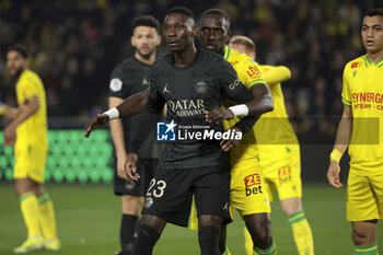 2024-02-17 - Randal Kolo Muani of PSG, Moussa Sissoko of Nantes during the French championship Ligue 1 football match between FC Nantes and Paris Saint-Germain on February 17, 2024 at La Beaujoire - Louis Fonteneau stadium in Nantes, France - FOOTBALL - FRENCH CHAMP - NANTES V PARIS SG - FRENCH LIGUE 1 - SOCCER
