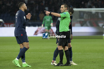 2024-02-25 - Kylian Mbappe of PSG, referee Bastien Dechepy during the French championship Ligue 1 football match between Paris Saint-Germain and Stade Rennais (Rennes) on February 25, 2024 at Parc des Princes stadium in Paris, France - FOOTBALL - FRENCH CHAMP - PARIS SG V RENNES - FRENCH LIGUE 1 - SOCCER