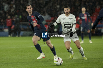 2024-02-25 - Fabian Ruiz Pena of PSG, Martin Terrier of Rennes during the French championship Ligue 1 football match between Paris Saint-Germain and Stade Rennais (Rennes) on February 25, 2024 at Parc des Princes stadium in Paris, France - FOOTBALL - FRENCH CHAMP - PARIS SG V RENNES - FRENCH LIGUE 1 - SOCCER