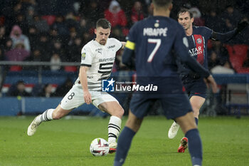 2024-02-25 - Baptiste Santamaria of Rennes during the French championship Ligue 1 football match between Paris Saint-Germain and Stade Rennais (Rennes) on February 25, 2024 at Parc des Princes stadium in Paris, France - FOOTBALL - FRENCH CHAMP - PARIS SG V RENNES - FRENCH LIGUE 1 - SOCCER