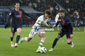 2024-02-25 - Desire Doue of Rennes, Lucas Hernandez of PSG, left Fabian Ruiz Pena of PSG during the French championship Ligue 1 football match between Paris Saint-Germain and Stade Rennais (Rennes) on February 25, 2024 at Parc des Princes stadium in Paris, France - FOOTBALL - FRENCH CHAMP - PARIS SG V RENNES - FRENCH LIGUE 1 - SOCCER