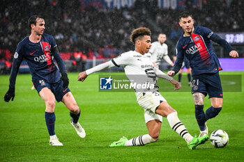 2024-02-25 - Fabian RUIZ of PSG, Desire DOUE of Rennes and Lucas HERNANDEZ of PSG during the French championship Ligue 1 football match between Paris Saint-Germain and Stade Rennais (Rennes) on February 25, 2024 at Parc des Princes stadium in Paris, France - FOOTBALL - FRENCH CHAMP - PARIS SG V RENNES - FRENCH LIGUE 1 - SOCCER