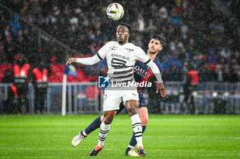2024-02-25 - Arnaud KALIMUENDO of Rennes and Lucas BERALDO of PSG during the French championship Ligue 1 football match between Paris Saint-Germain and Stade Rennais (Rennes) on February 25, 2024 at Parc des Princes stadium in Paris, France - FOOTBALL - FRENCH CHAMP - PARIS SG V RENNES - FRENCH LIGUE 1 - SOCCER