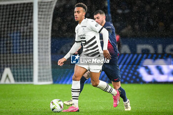 2024-02-25 - Guela DOUE of Rennes and Lucas HERNANDEZ of PSG during the French championship Ligue 1 football match between Paris Saint-Germain and Stade Rennais (Rennes) on February 25, 2024 at Parc des Princes stadium in Paris, France - FOOTBALL - FRENCH CHAMP - PARIS SG V RENNES - FRENCH LIGUE 1 - SOCCER
