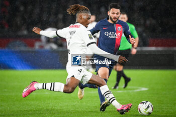 2024-02-25 - Christopher WOOH of Rennes and Goncalo RAMOS of PSG during the French championship Ligue 1 football match between Paris Saint-Germain and Stade Rennais (Rennes) on February 25, 2024 at Parc des Princes stadium in Paris, France - FOOTBALL - FRENCH CHAMP - PARIS SG V RENNES - FRENCH LIGUE 1 - SOCCER