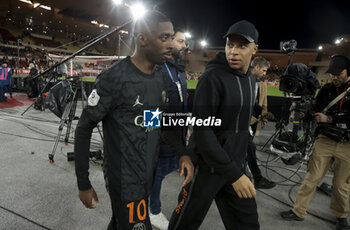 2024-03-01 - Ousmane Dembele and Kylian Mbappe of PSG following the French championship Ligue 1 football match between AS Monaco (ASM) and Paris Saint-Germain (PSG) on March 1, 2024 at Stade Louis II in Monaco - FOOTBALL - FRENCH CHAMP - MONACO V PARIS SG - FRENCH LIGUE 1 - SOCCER