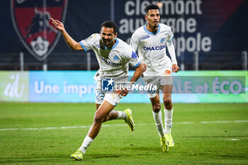 2024-03-02 - Iliman NDIAYE of Marseille celebrate his goal with Azzedine OUNAHI of Marseille during the French championship Ligue 1 football match between Clermont Foor 63 and Olympique de Marseille on March 2, 2024 at Gabriel Montpied stadium in Clermont-Ferrand, France - FOOTBALL - FRENCH CHAMP - CLERMONT V MARSEILLE - FRENCH LIGUE 1 - SOCCER