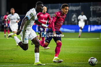 2024-03-02 - Ismaila SARR of Marseille and Neto BORGES of Clermont during the French championship Ligue 1 football match between Clermont Foor 63 and Olympique de Marseille on March 2, 2024 at Gabriel Montpied stadium in Clermont-Ferrand, France - FOOTBALL - FRENCH CHAMP - CLERMONT V MARSEILLE - FRENCH LIGUE 1 - SOCCER