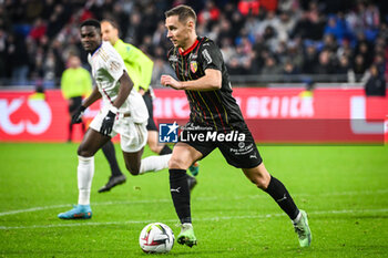 2024-03-03 - Przemyslaw Adam FRANKOWSKI of Lens during the French championship Ligue 1 football match between Olympique Lyonnais and RC Lens on March 3, 2024 at Groupama stadium in Decines-Charpieu near Lyon, France - FOOTBALL - FRENCH CHAMP - LYON V LENS - FRENCH LIGUE 1 - SOCCER