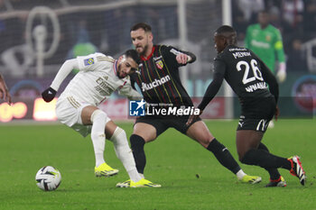 2024-03-03 - Mohamed Said BENRAHMA of Lyon and Jonathan GRADIT of Lens during the French championship Ligue 1 football match between Olympique Lyonnais and RC Lens on March 3, 2024 at Groupama stadium in Décines-Charpieu near Lyon, France - FOOTBALL - FRENCH CHAMP - LYON V LENS - FRENCH LIGUE 1 - SOCCER