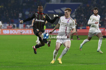 2024-03-03 - Sepe WAHI of Lens and Jake O’BRIEN of Lyon during the French championship Ligue 1 football match between Olympique Lyonnais and RC Lens on March 3, 2024 at Groupama stadium in Décines-Charpieu near Lyon, France - FOOTBALL - FRENCH CHAMP - LYON V LENS - FRENCH LIGUE 1 - SOCCER