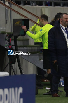 2024-03-03 - Referee Jerome BRISARD and VAR during the French championship Ligue 1 football match between Olympique Lyonnais and RC Lens on March 3, 2024 at Groupama stadium in Décines-Charpieu near Lyon, France - FOOTBALL - FRENCH CHAMP - LYON V LENS - FRENCH LIGUE 1 - SOCCER