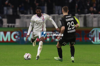 2024-03-03 - Ainsley MAITLAND NILES of Lyon and Przemyslaw FRANKOWSKI of Lyon during the French championship Ligue 1 football match between Olympique Lyonnais and RC Lens on March 3, 2024 at Groupama stadium in Décines-Charpieu near Lyon, France - FOOTBALL - FRENCH CHAMP - LYON V LENS - FRENCH LIGUE 1 - SOCCER