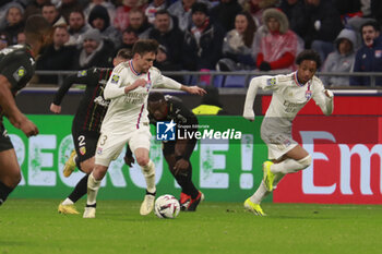 2024-03-03 - Nicolas TAGLIAFICO of Lyon and Malick FOFANA of Lyon during the French championship Ligue 1 football match between Olympique Lyonnais and RC Lens on March 3, 2024 at Groupama stadium in Décines-Charpieu near Lyon, France - FOOTBALL - FRENCH CHAMP - LYON V LENS - FRENCH LIGUE 1 - SOCCER