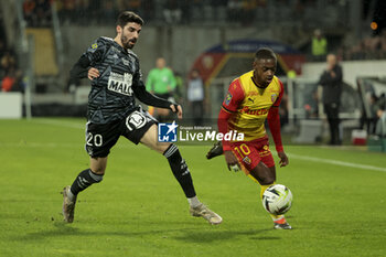 2024-03-09 - David Pereira Da Costa of Lens, left Pierre Lees-Melou of Brest during the French championship Ligue 1 football match between RC Lens and Stade Brestois on March 9, 2024 at Bollaert Delelis stadium in Lens, France - FOOTBALL - FRENCH CHAMP - LENS V BREST - FRENCH LIGUE 1 - SOCCER