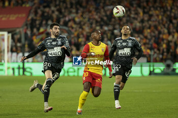 2024-03-09 - Pierre Lees-Melou of Brest, David Pereira Da Costa of Lens, Kenny Lala of Brest during the French championship Ligue 1 football match between RC Lens and Stade Brestois on March 9, 2024 at Bollaert Delelis stadium in Lens, France - FOOTBALL - FRENCH CHAMP - LENS V BREST - FRENCH LIGUE 1 - SOCCER