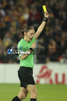 2024-03-09 - Referee Stephanie Frappart gives a yellow card during the French championship Ligue 1 football match between RC Lens and Stade Brestois on March 9, 2024 at Bollaert Delelis stadium in Lens, France - FOOTBALL - FRENCH CHAMP - LENS V BREST - FRENCH LIGUE 1 - SOCCER