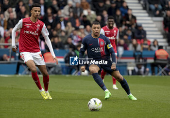 2024-03-10 - Kylian Mbappe of PSG, left Amir Richardson of Reims during the French championship Ligue 1 football match between Paris Saint-Germain and Stade de Reims on March 10, 2024 at Parc des Princes stadium in Paris, France - FOOTBALL - FRENCH CHAMP - PARIS SG V REIMS - FRENCH LIGUE 1 - SOCCER