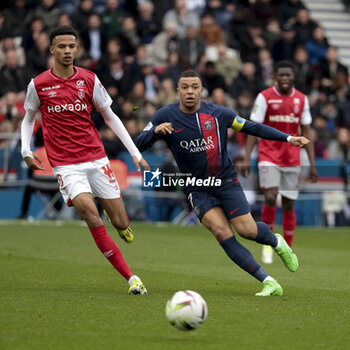 2024-03-10 - Kylian Mbappe of PSG, left Amir Richardson of Reims during the French championship Ligue 1 football match between Paris Saint-Germain and Stade de Reims on March 10, 2024 at Parc des Princes stadium in Paris, France - FOOTBALL - FRENCH CHAMP - PARIS SG V REIMS - FRENCH LIGUE 1 - SOCCER