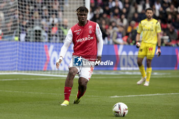 2024-03-10 - Emmanuel Agbadou of Reims during the French championship Ligue 1 football match between Paris Saint-Germain and Stade de Reims on March 10, 2024 at Parc des Princes stadium in Paris, France - FOOTBALL - FRENCH CHAMP - PARIS SG V REIMS - FRENCH LIGUE 1 - SOCCER