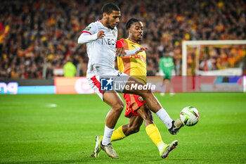 2024-03-16 - Jean-Clair TODIBO of Nice and Elye WAHI of Lens during the French championship Ligue 1 football match between RC Lens and OGC Nice on March 16, 2024 at Bollaert-Delelis stadium in Lens, France - FOOTBALL - FRENCH CHAMP - LENS V NICE - FRENCH LIGUE 1 - SOCCER