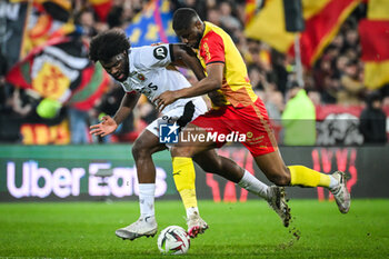 2024-03-16 - Terem MOFFI of Nice and Kevin DANSO of Lens during the French championship Ligue 1 football match between RC Lens and OGC Nice on March 16, 2024 at Bollaert-Delelis stadium in Lens, France - FOOTBALL - FRENCH CHAMP - LENS V NICE - FRENCH LIGUE 1 - SOCCER