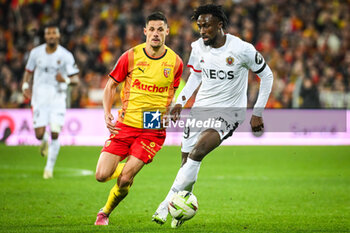 2024-03-16 - Florian SOTOCA of Lens and Evann GUESSAND of Nice during the French championship Ligue 1 football match between RC Lens and OGC Nice on March 16, 2024 at Bollaert-Delelis stadium in Lens, France - FOOTBALL - FRENCH CHAMP - LENS V NICE - FRENCH LIGUE 1 - SOCCER