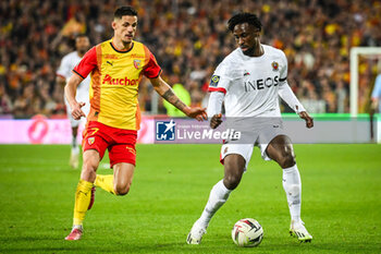 2024-03-16 - Florian SOTOCA of Lens and Evann GUESSAND of Nice during the French championship Ligue 1 football match between RC Lens and OGC Nice on March 16, 2024 at Bollaert-Delelis stadium in Lens, France - FOOTBALL - FRENCH CHAMP - LENS V NICE - FRENCH LIGUE 1 - SOCCER