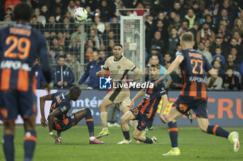 2024-03-17 - Achraf Hakimi of PSG, Lucas Mincarelli-Davin of Montpellier during the French championship Ligue 1 football match between Montpellier HSC (MHSC) and Paris Saint-Germain (PSG) on March 17, 2024 at La Mosson stadium in Montpellier, France - FOOTBALL - FRENCH CHAMP - MONTPELLIER V PARIS SG - FRENCH LIGUE 1 - SOCCER