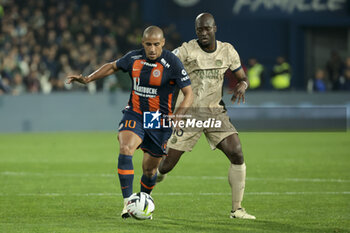 2024-03-17 - Wahbi Khazri of Montpellier, Danilo Pereira of PSG during the French championship Ligue 1 football match between Montpellier HSC (MHSC) and Paris Saint-Germain (PSG) on March 17, 2024 at La Mosson stadium in Montpellier, France - FOOTBALL - FRENCH CHAMP - MONTPELLIER V PARIS SG - FRENCH LIGUE 1 - SOCCER