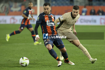 2024-03-17 - Wahbi Khazri of Montpellier, Lucas Hernandez of PSG during the French championship Ligue 1 football match between Montpellier HSC (MHSC) and Paris Saint-Germain (PSG) on March 17, 2024 at La Mosson stadium in Montpellier, France - FOOTBALL - FRENCH CHAMP - MONTPELLIER V PARIS SG - FRENCH LIGUE 1 - SOCCER