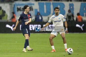 2024-03-31 - Iliman Ndiaye of Marseille, left Vitinha of PSG during the French championship Ligue 1 football match between Olympique de Marseille (OM) and Paris Saint-Germain (PSG) on March 31, 2024 at Stade Velodrome in Marseille, France - FOOTBALL - FRENCH CHAMP - MARSEILLE V PARIS SG - FRENCH LIGUE 1 - SOCCER